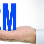 Man holding the acronym CRM