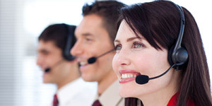happy workers with headsets